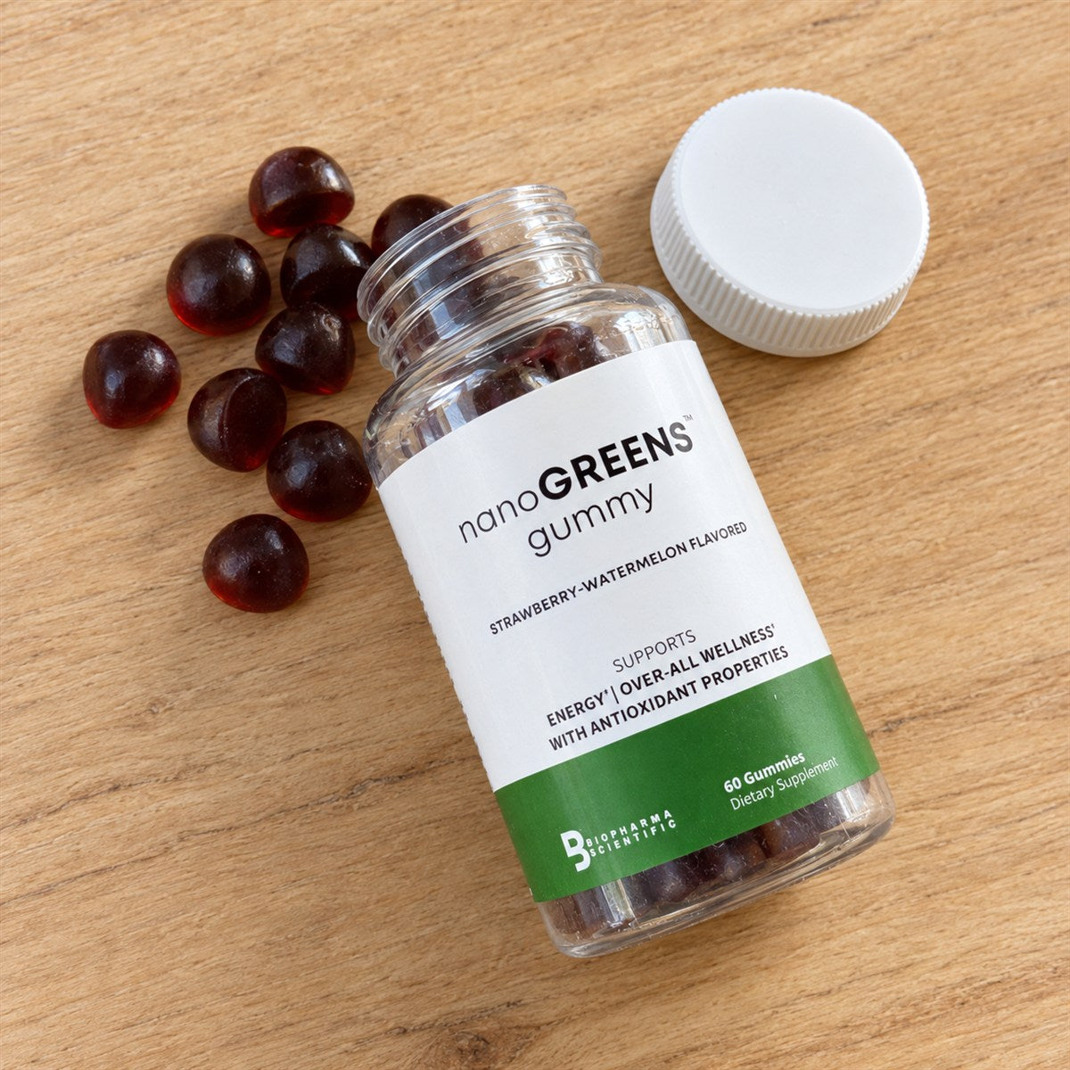 NanoGreens Gummies open bottle with gummies